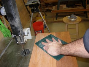 Sanding down the first coat