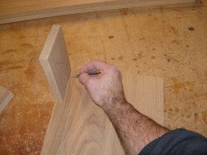 Using a support rail cut-off to mark the legs