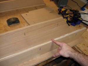 Spreading the glue on the support rails