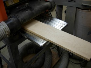 Planing down a piece of maple