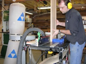 Cutting the raised panel feature into the face of the door