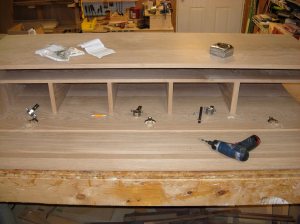 Cabinet side hinges installed