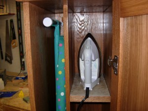 Iron sits on ceramic tile