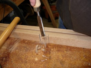 Chiseling out the notches for the stretchers