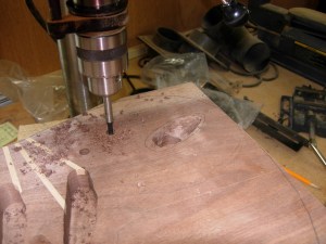 Drilling out the centers for the tone and volume knobs