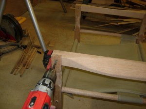 Drilling the pivot hole through the arms