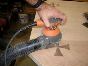 Sanding down the crosses