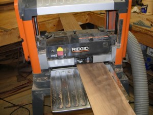 Planing down the carved trim