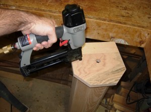 Nailing the first cap on the column