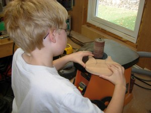 Sanding the pig parts