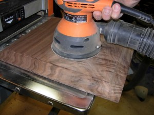 Sanding down the panels