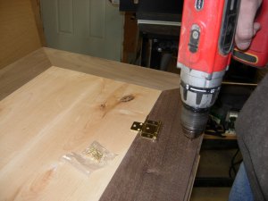 Pre-drilling the screw holes