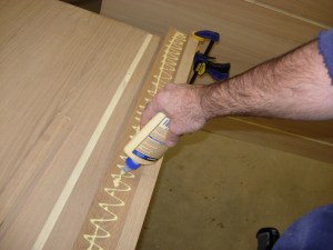 Attaching spacer and applying glue