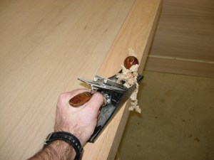 Planing down the corner piece while it is sitting there...