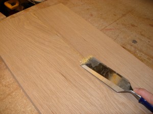 Scraping the glue squeeze-out