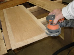 Sanding the panel down