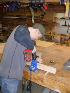 Drilling pocket holes along the top