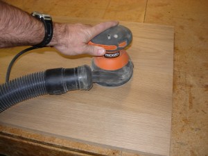 Sanding down the panel