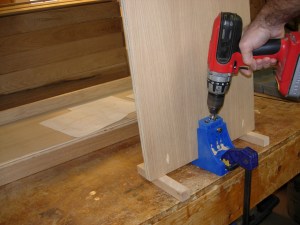 Drilling the top attachment pocket holes