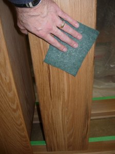 Sanding down the first coat