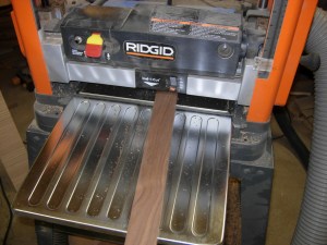 Planing a piece of walnut