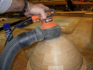 Sanding the top round