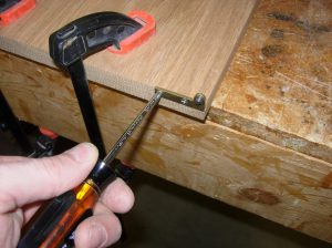 Attaching the bottom hinge