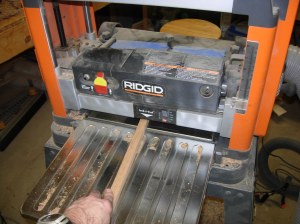 Planing down a scrap for the cross