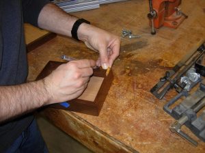 Scribing the hinge locations