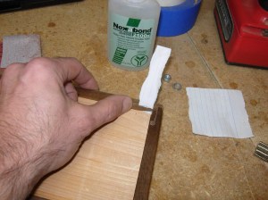 CA glue applied with a strip of paper