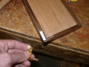 Shimming the first hinge