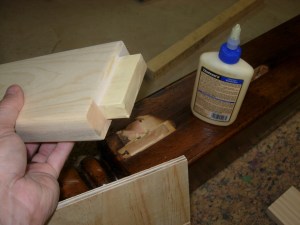 Applying glue to the tenons