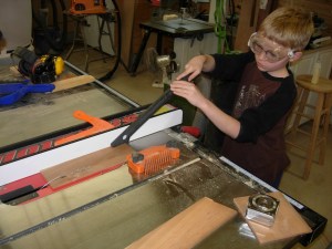 Adam ripping the sides of the box