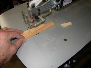 Cutting the center divider on the scroll saw