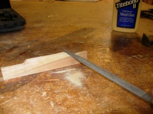 Rasping some curves into the divider