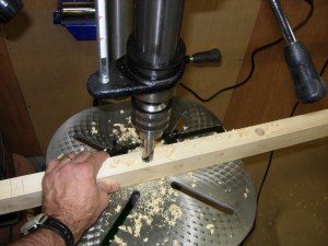 Drilling holes in the center beam