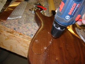 Drilling the mounting holes for the rear cover plate