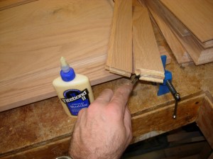 Applying glue to the rail ends