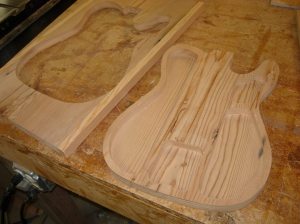 Cut out and lightly sanded