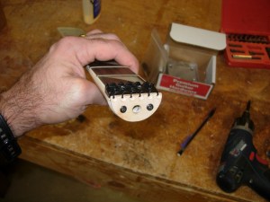 Attaching nut and headplate