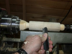 Taking the square edges off with the roughing gouge 