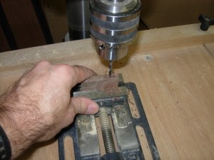 Drilling out the string guide