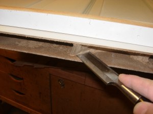 Detach the cardboard at the opening