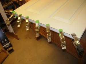 Clamp the door end back together