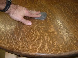 Sanding the surface with #00 steel wool