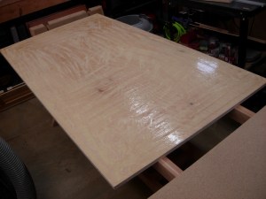 Coating the plywood with glue
