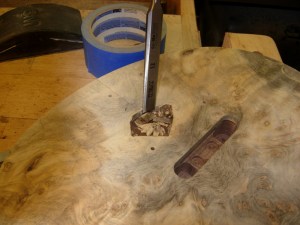 Chisel away everything inside the mark