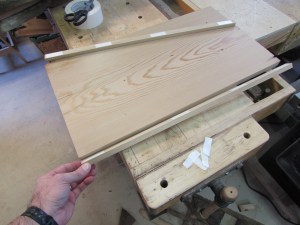 Attaching strips to the side with 2-sided tape