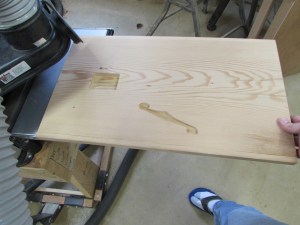 Side one of the top carved