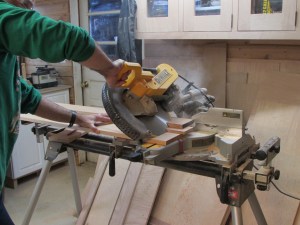 Mitering the base trim assembly